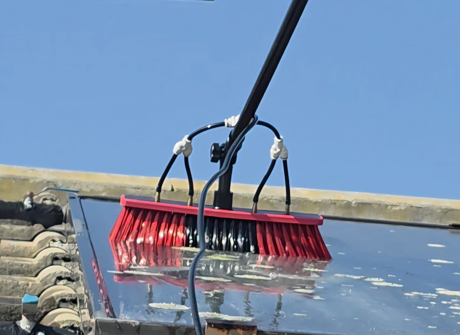 Soft non-abrasive brush cleaning photovoltaic glass